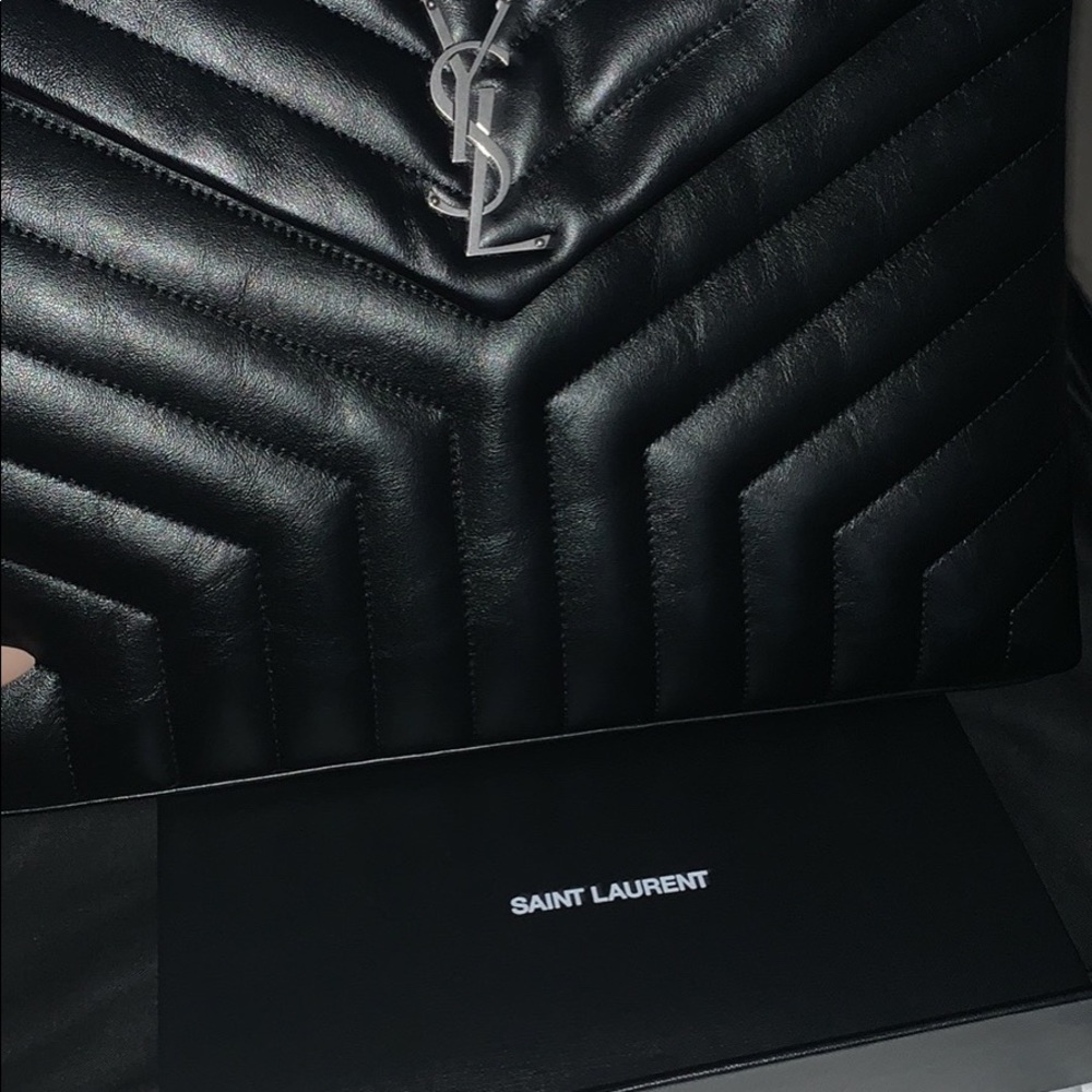 1. YSL oversized pouch/document holder